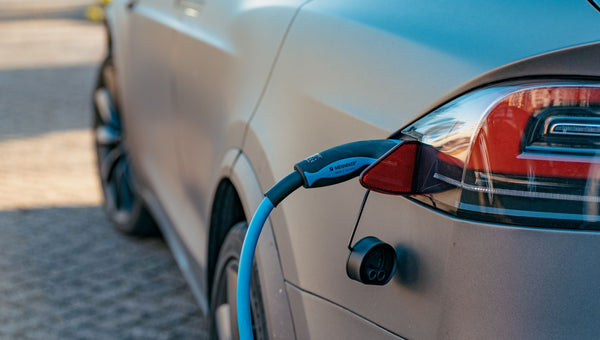 using portable solar panels to charge EVs